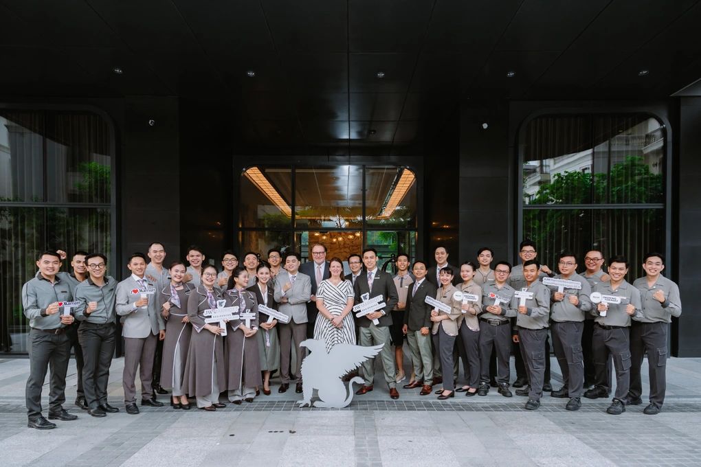 A group of people posing for a photoAI-generated content may be incorrect.